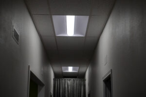 Overhead lights illuminate a hallway at Utopia Salon on Sept. 16. Utopia Salon is one of the local businesses that has recently used Clark Public Utilities’ incentives to install new lights to lower electricity use. (Amanda Cowan/The Columbian)