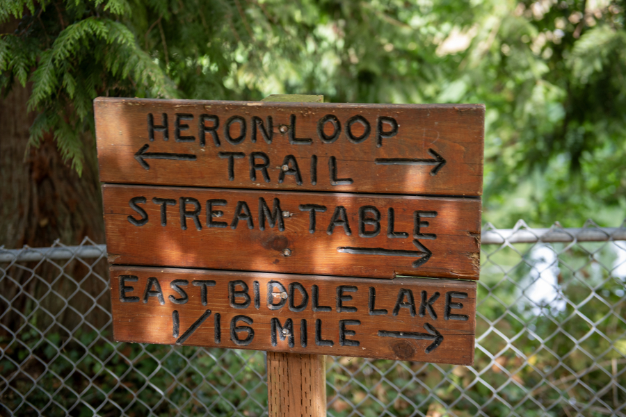 A sign points the way to East Biddle Lake at Columbia Springs in Vancouver on Monday morning.