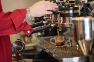 Manager Tiernan Stanley pulls a shot of espresso Monday at Compass Coffee Roasting in Washougal.