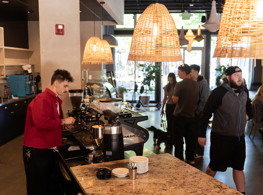 Manager Tiernan Stanley pulls a shot of espresso Monday at Compass Coffee Roasting in Washougal. (Taylor Balkom/The Columbian)
