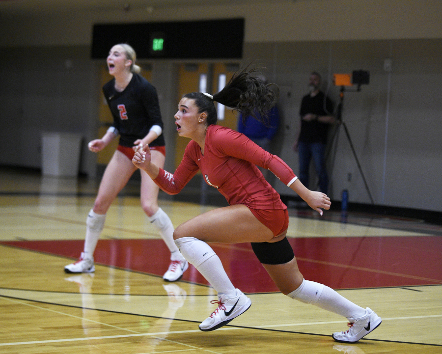 Camas senior Emmah Sanchez, right, prepares to make a dig during a non-league volleyball match against Columbia River on Monday, Sept. 22, 2025 at Camas High School. (Micah Rice/The Columbian)