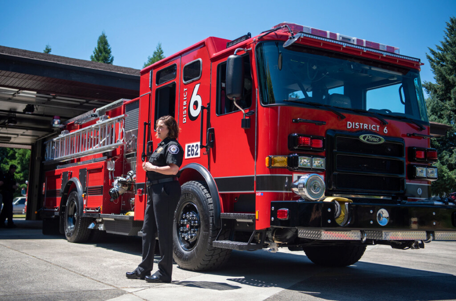Now-former Fire Chief Kristan Maurer stands in front of a new fire engine July 13, 2023, at Clark County Fire District 6 Station 62. (Taylor Balkom/The Columbian files)