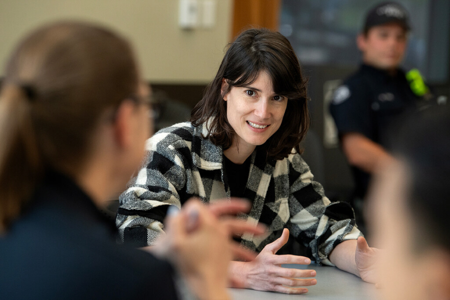 Rep. Marie Gluesenkamp Perez, D-Skamania, in plaid, holds a roundtable with Clark County first responders at Vancouver City Hall on June 20, 2024. (Amanda Cowan/The Columbian files)