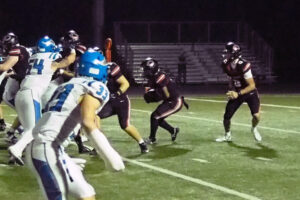 Camas running back Thor Brody, middle, looks for a hole against Coeur d’Alene during the non-league game Friday at Doc Harris Stadium. (Jeff Klein/The Columbian)