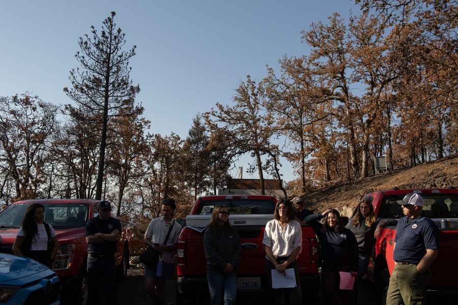 Officials gather on Sept. 24 to tour two sites within the Burdoin Fire area to see how well treatment areas withstood the wildfire near White Salmon. (Amanda Cowan/The Columbian)