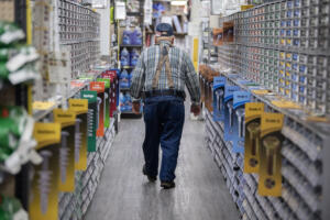 Customer Al Schmid of Washougal strolls the aisles at Lutz Hardware in Camas on Monday afternoon. (Amanda Cowan/The Columbian)