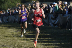Cohen Butler of Camas runs in the Danner Championships race at Nike Portland XC meet on Friday at Blue Lake Regional Park in Gresham, Ore. Butler, a senior, finished fourth in a personal-best time of 14 minutes, 40.8 seconds. (Micah Rice/The Columbian)