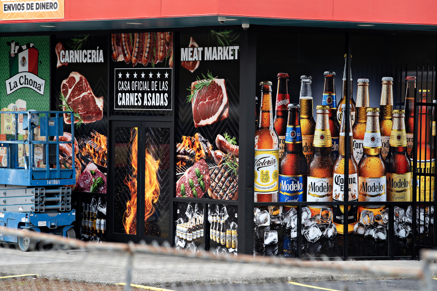 A sign on the outside of La Tapatia Mexican Super Market advertises steak. U.S. prices for beef steak rose more than 12 percent over the last year. (Amanda Cowan/The Columbian)