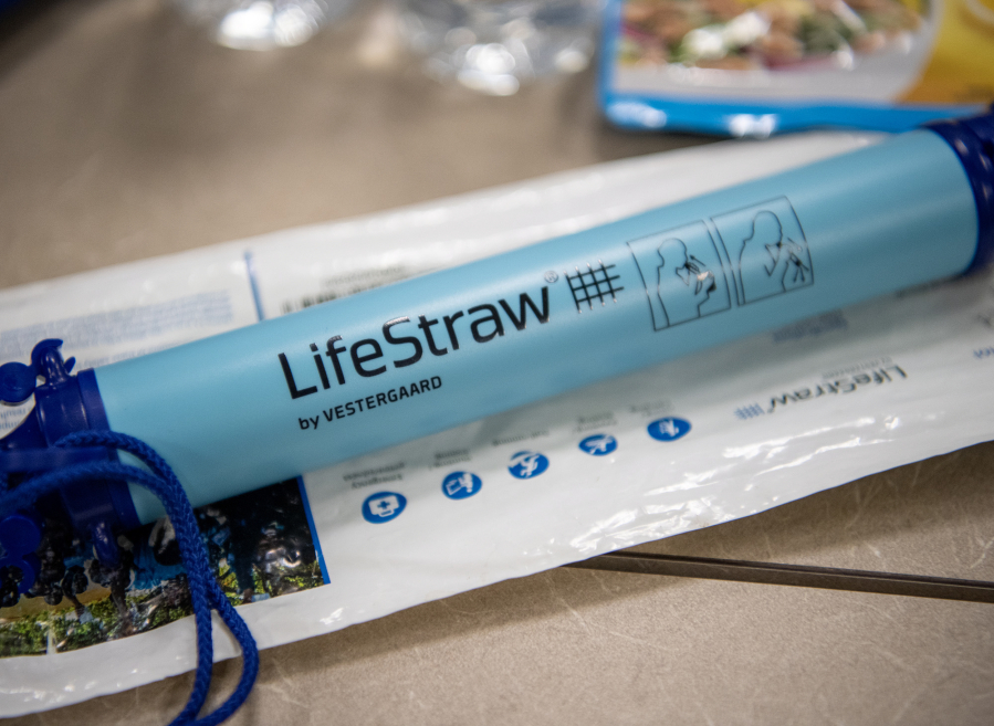 Emergency supplies typically found in “go bags” sit on a table Tuesday at Clark Regional Emergency Services. (Taylor Balkom/The Columbian)