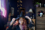 Angel Biederbeck, high priestess of the Columbia River Witches Collective, adjusts her hat at her Camas home on Oct. 14. The collective has 434 Facebook followers and a core coven of 13 witches. (Amanda Cowan/The Columbian)