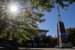 Washougal’s newest piece of public artwork has been installed on the campanile at Reflection Plaza, as seen Monday morning. The Two Rivers Heritage Sculpture, created by Vancouver artist Sharon Agnor, made of metal and glass, depicts key events from Washougal’s history and displays the city’s location near the confluence of the Washougal and Columbia rivers. (Photos by Amanda Cowan/The Columbian)