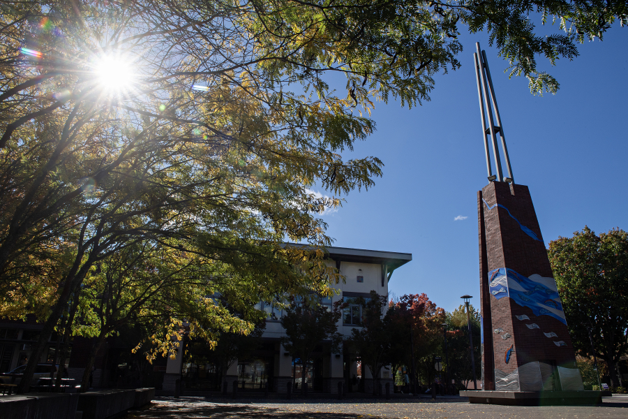Washougal&rsquo;s newest piece of public artwork has been installed on the campanile at Reflection Plaza, as seen Monday morning. The Two Rivers Heritage Sculpture, created by Vancouver artist Sharon Agnor, made of metal and glass, depicts key events from Washougal&rsquo;s history and displays the city&rsquo;s location near the confluence of the Washougal and Columbia rivers. (Photos by Amanda Cowan/The Columbian)