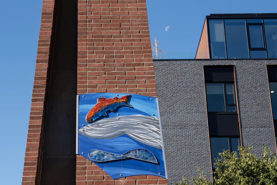 The Two Rivers Heritage Sculpture, created by Vancouver artist Sharon Agnor, is made of metal and glass installed on the campanile in Washougal’s Reflection Plaza. (Amanda Cowan/The Columbian)