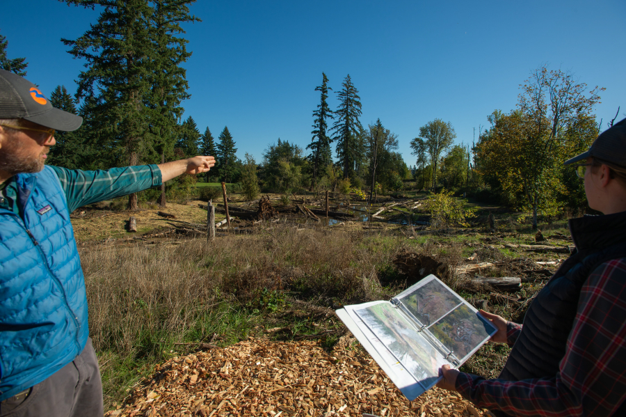 Chris Collins, restoration project leader, discusses how the city of Washougal and Lower Columbia Estuary Partnership worked to reconnect Campen Creek and restore floodplain habitat at Mable Kerr Park. (Photos by James Rexroad/for The Columbian)