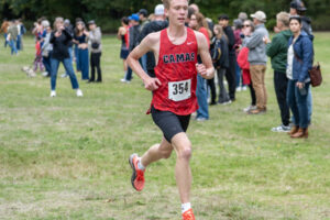 Camas senior Cohen Butler finishes in first place Wednesday at the 4A district meet at Lewisville Regional Park in Battle Ground. (Taylor Balkom/The Columbian)