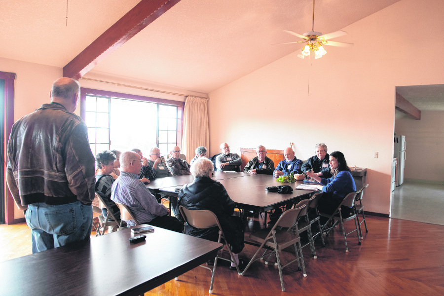 Rep. Marie Gluesenkamp Perez, right, meets with residents of the Vista Del Rio mobile home park in Vancouver on Wednesday afternoon. Residents of the park expressed their fears of their homes being sold out from under them. (Photos by Amanda Cowan/The Columbian)