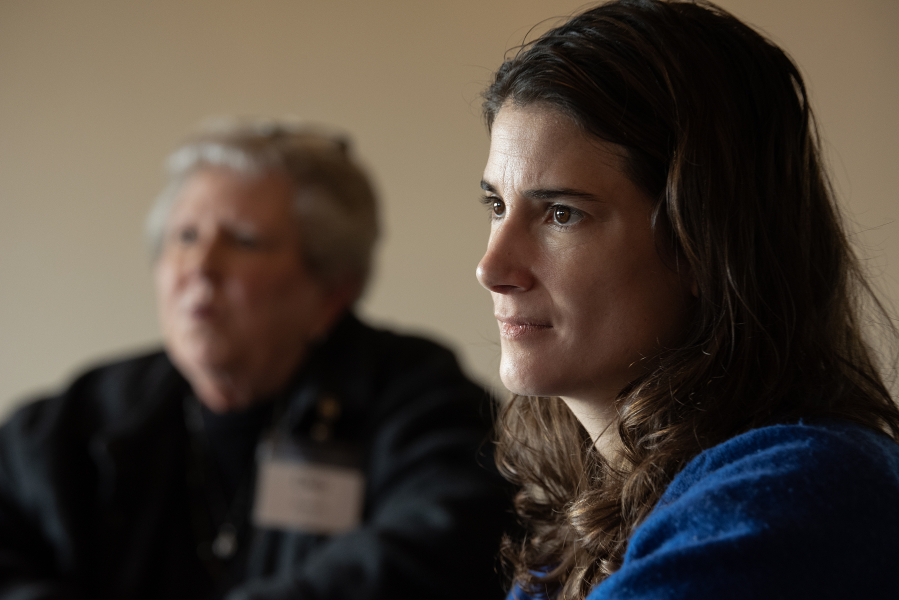 Deb Swope, left, resident of the Vista Del Rio mobile home park, joins Rep. Marie Gluesenkamp Perez, D-Skamania, during a meeting at the clubhouse on Wednesday afternoon. Swope and other residents have been working to preserve the mobile home community as the property is up for sale.