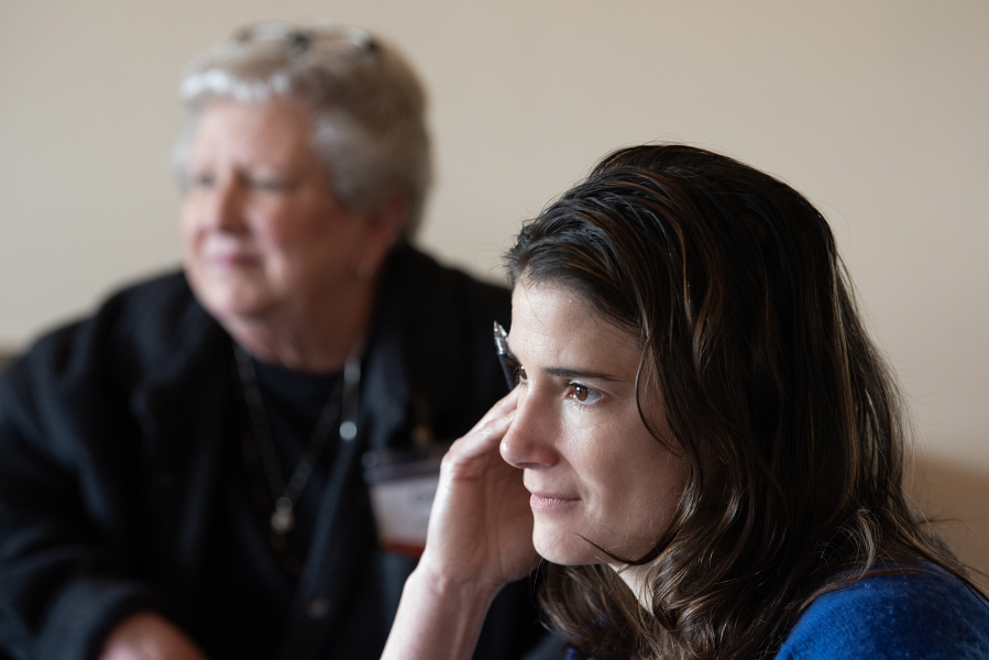 Deb Swope, left, resident of the Vista Del Rio mobile home park, joins Rep. Marie Gluesenkamp Perez, D-Skamania, during a meeting at the clubhouse on Wednesday afternoon. Swope and other residents have been working to preserve the mobile home community as the property is up for sale. (Amanda Cowan/The Columbian)