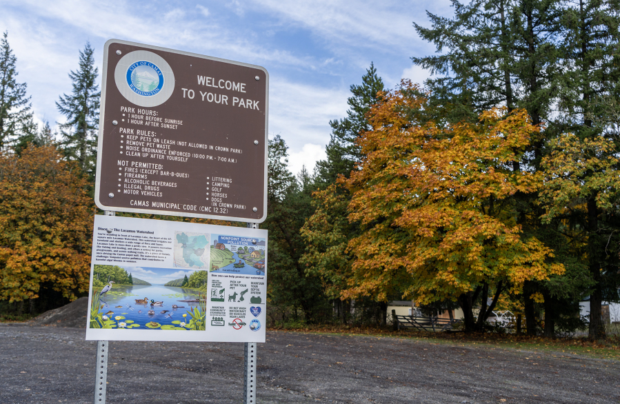 A sign informs passersby about nonpoint source pollutants affecting Lacamas Lake on Monday at Lacamas Lake in Camas. The signs were installed after a partnership between the city of Camas and the Camas High School Watershed Alliance Club. (Taylor Balkom/The Columbian)
