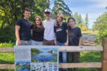 Camas High School students, from left to right, Colton Schaefer, Veronica Sparling, Austin Anderson, Dana Sparling and Audreen Tsai, members of the Camas High School Watershed Alliance Club, pose for a photo in front of one of their informational signs at Lacamas Lake in September. (Contributed by the city of Camas)