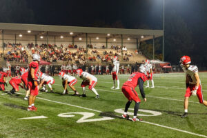 Camas quarterback Tyson Ruggiero (0) looks over the Union defense prior to the snap during the first quarter on Friday, Oct. 24, 2025, at McKenzie Stadiium. Ruggiero would run for two touchdowns in the first quarter and throw the first of two TDs to Charlie Barr in the game they would go on to win 50-0.. (Jeff Klein/The Columbian)
