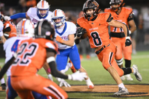 Washougal senior Royce Jones (8) leads the area with 1,198 rushing yards and 19 touchdowns as the Panthers get set for the postseason. (Taylor Balkom/The Columbian)