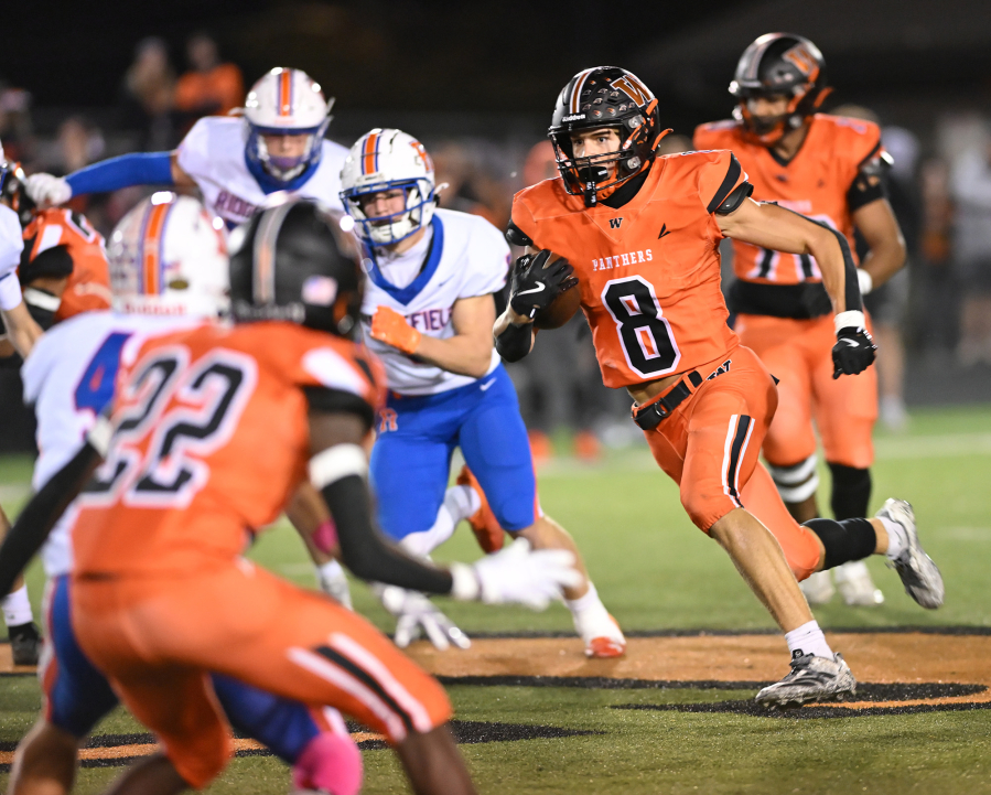 Washougal senior Royce Jones (8) leads the area with 1,198 rushing yards and 19 touchdowns as the Panthers get set for the postseason. (Taylor Balkom/The Columbian)