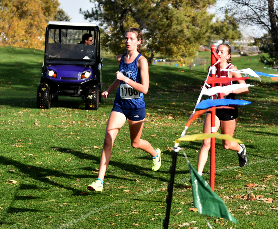 Graysen Aldridge of Hockinson, left, competes in the 2A girls race at the state cross country championships on Saturday, Nov. 8, 2025 at Sun Willows Golf Course in Pasco. (Micah Rice/The Columbian)