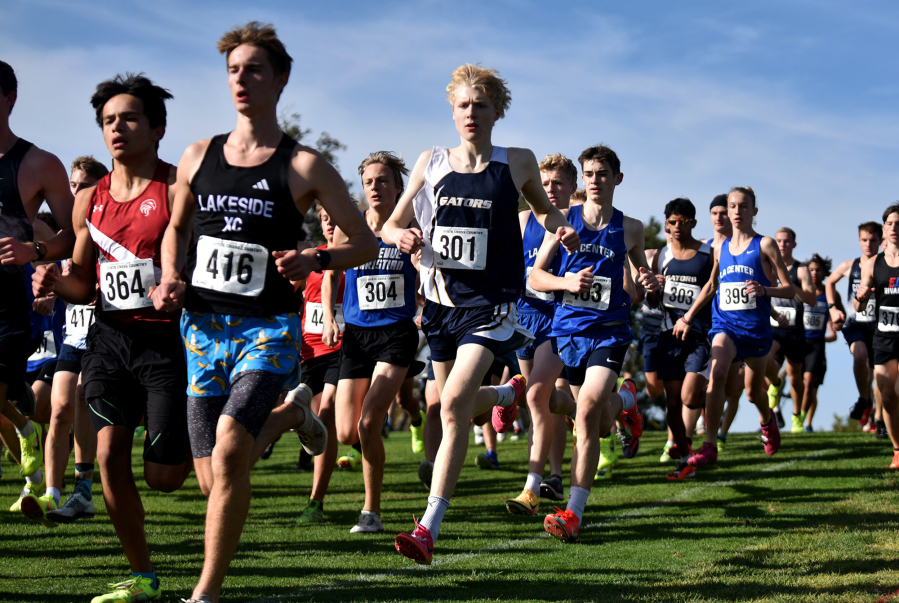 Runners compete in the 1A boys race at the state cross country championships on Saturday, Nov. 8, 2025 at Sun Willows Golf Course in Pasco. (Micah Rice/The Columbian)