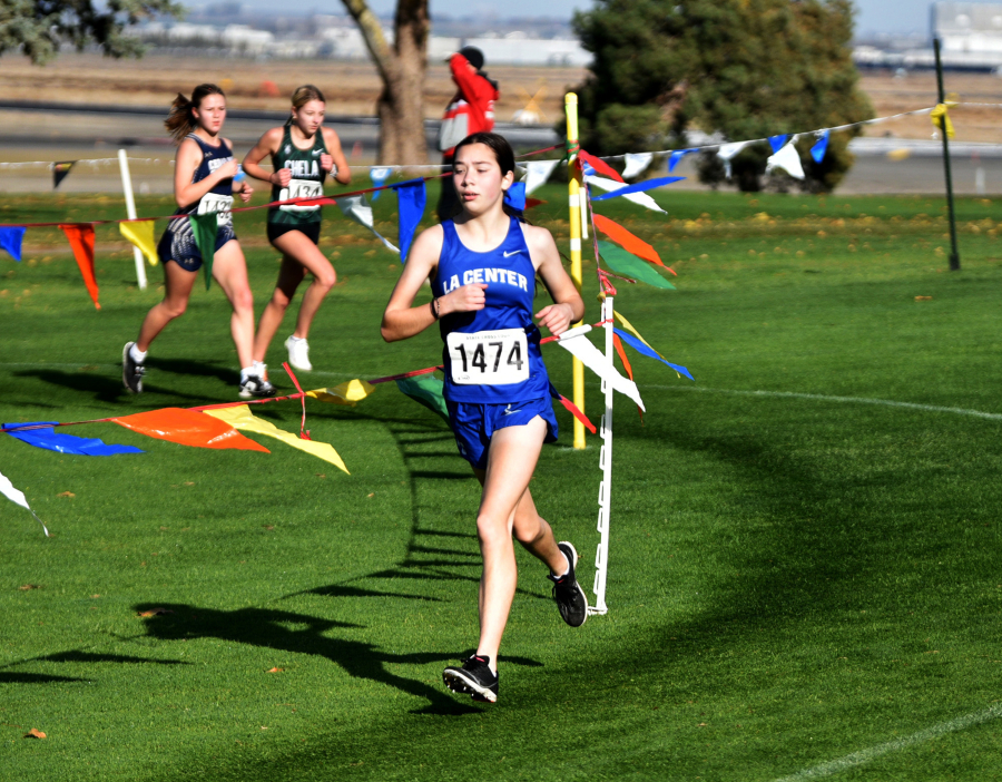 Sasha Pash of La Center competes in the 1A girls race at the state cross country championships on Saturday, Nov. 8, 2025 at Sun Willows Golf Course in Pasco. (Micah Rice/The Columbian)