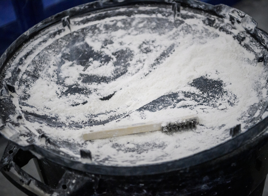 Chalk sits in a lid Sunday at VEGA Gymnastics in Washougal. (Taylor Balkom/The Columbian)