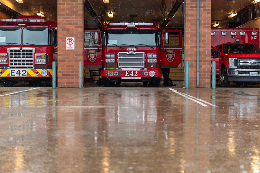 Fire trucks stay dry inside Camas Fire Station 42 on March 21. (Taylor Balkom/The Columbian files)