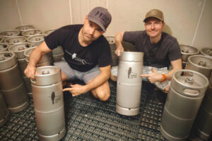 Black Drongo Brewery co-founders Devin Nail, left, and Tim Smith pose for a photo at their Yilan City, Taiwan, brewery. (Contributed by Black Drongo Brewery)