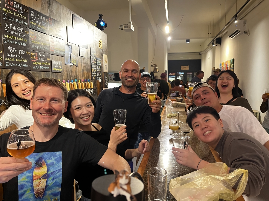 Black Drongo Brewery co-founders Tim Smith, second from left, Bella Wang, third from left, and Devin Nail, center, pose for a photo at their Yilan City, Taiwan, brewery. (Black Drongo Brewery)