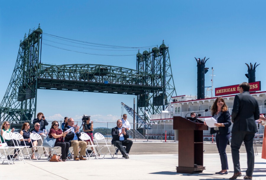 Port of Vancouver USA CEO Julianna Marler, second from right, introduces Washington State Treasurer Mike Pellicciotti, right, during a lift of the Interstate 5 Bridge on June 12, 2023. (Taylor Balkom/The Columbian files)
