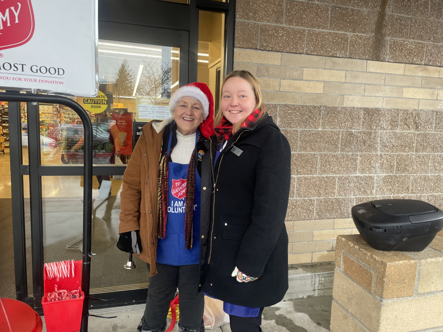 Washougal city Councilors Molly Coston, left, and Tia Robertson serve as &ldquo;bell ringers&rdquo; for the Camas-Washougal Salvation Army in December 2024. (Contributed by the city of Washougal)