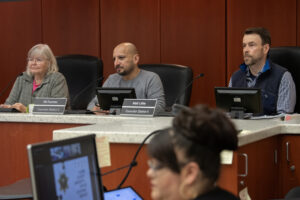 Clark County Council Chair Sue Marshall, from left, and Clark County Councilors Wil Fuentes and Matt Little confer at an April 9 meeting. (Amanda Cowan/The Columbian files)