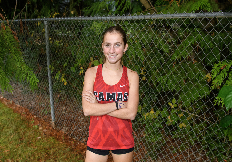 Camas cross country runner Kate Westfall stands for a portrait Thursday, Nov. 13, 2025, at Camas High School. Westfall is The Columbian&Ccedil;&fnof;&Ugrave;s All-Region girls cross country runner of the year. (Taylor Balkom/The Columbian)