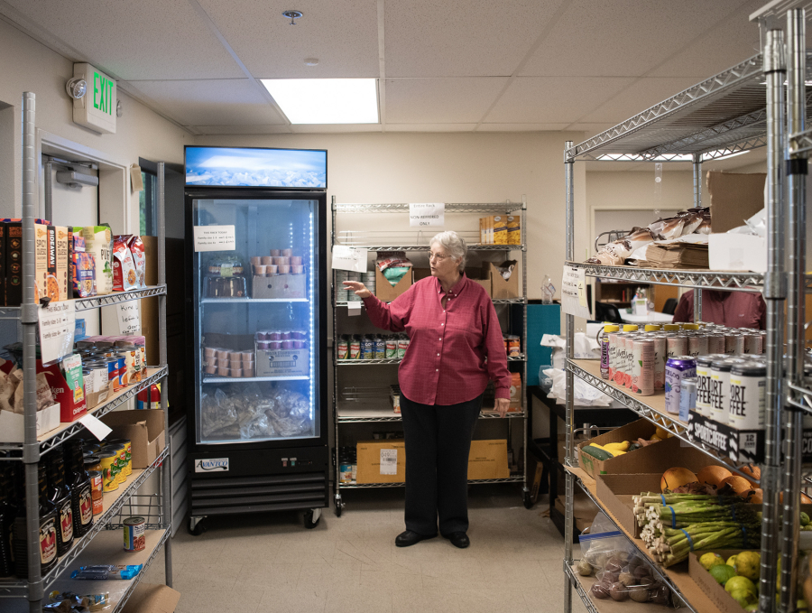 Vicki Smith, the longtime executive director of Martha&rsquo;s Pantry, gives a tour of the facility on a recent morning. (Taylor Balkom/The Columbian)