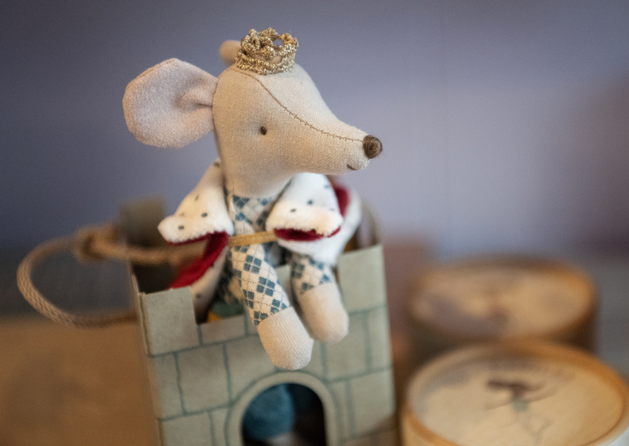 A stuffed heirloom doll sits in a castle Thursday at Periwinkle&rsquo;s Toy Shoppe in Camas.