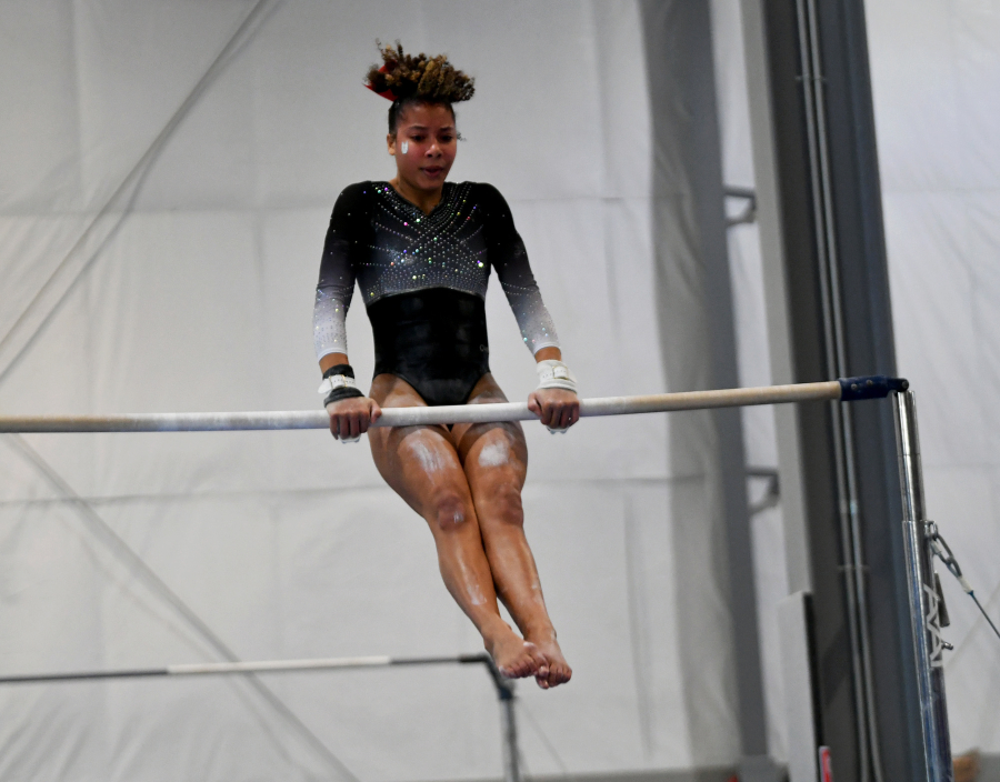Natalia Warren of Union performs on the uneven bars during a gymnastics meet at Naydenov Gymnastics on Saturday, Dec. 13, 2025 in Vancouver. (Micah Rice/The Columbian)