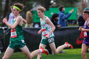 Cohen Butler of Camas (132) runs in the Nike Cross Nationals 5,000-meter men’s
championship race on Saturday at Glendoveer Golf Course in Portland. He posted a time of 15 minutes, 59.2 seconds. (Ken Martinez/West Coast XC)