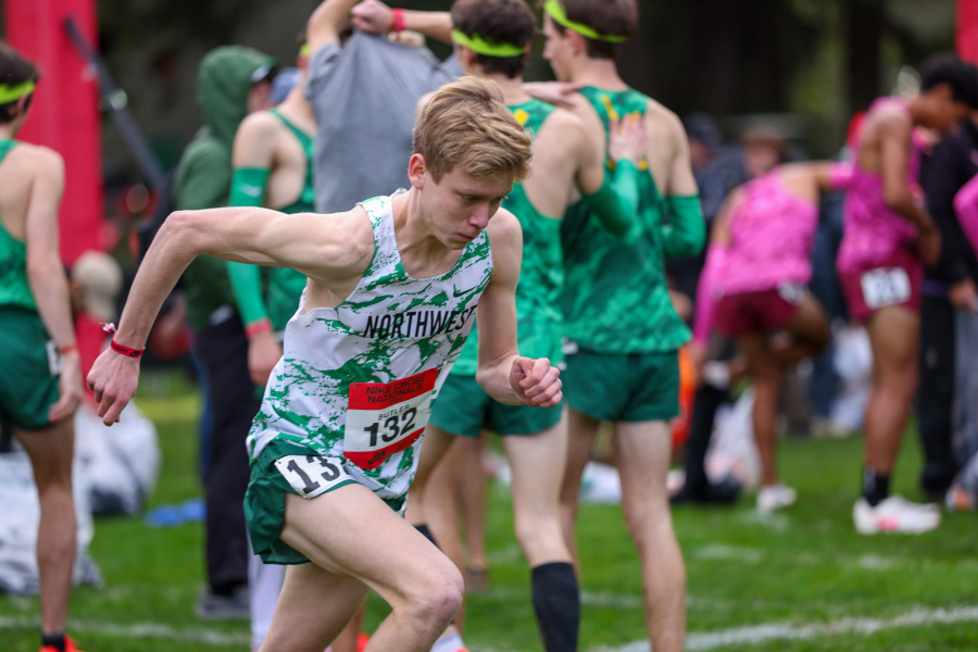 Cohen Butler of Camas (132) warms up prior to the start of the Nike Cross Nationals 5,000-meter men&rsquo;s championship race on Saturday, Dec. 6, 2025, at Glendoveer Golf Course in Portland. (Ken Martinez/West Coast XC)