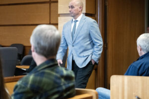 Former Camas-Washougal Fire Battalion Chief Kevin West walks into a courtroom Jan. 6 for his murder trial at the Clark County Courthouse. West is accused of strangling his wife in January 2024. The woman whose affections prosecutors say motivated a former Camas-Washougal Fire battalion chief to murder his wife took the stand Tuesday in Clark County Superior Court. Cynthia Ward said she and Kevin West are now engaged and living together. (Taylor Balkom/The Columbian files)