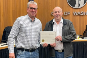 City of Washougal Mayor Pro-Tem David Fritz, left, and city Councilor David Szyplinski hold an oath-of-office certificate after Szyplinski was sworn in to the Washougal City Council&rsquo;s No. 5 position on Monday. (Contributed by the city of Washougal)