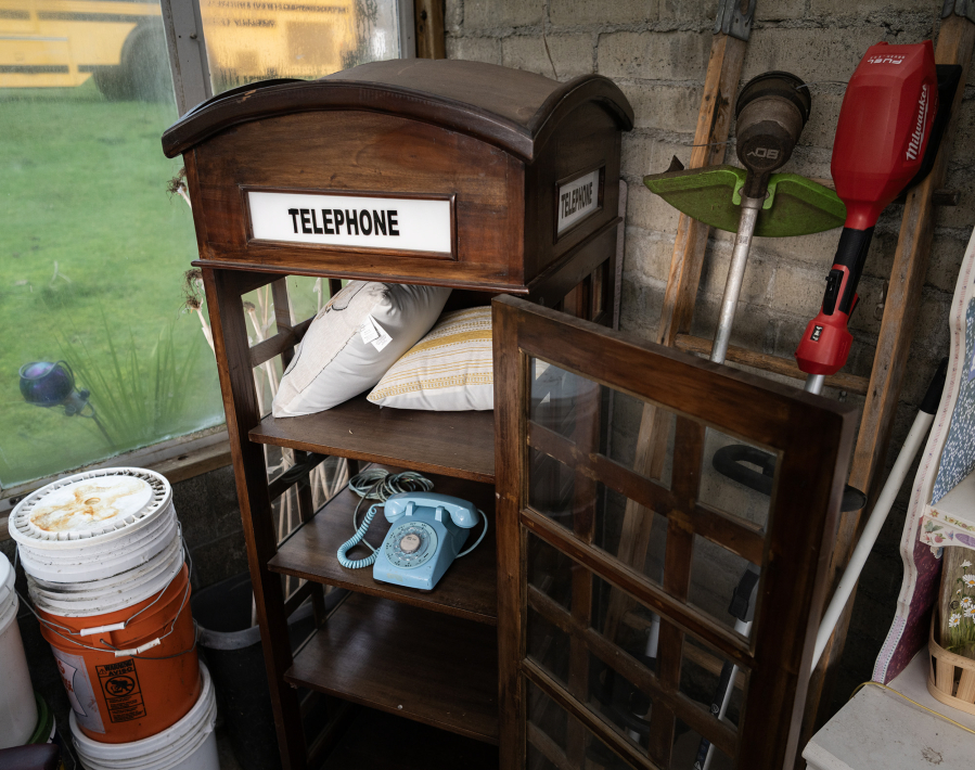 The &ldquo;wind phone&rdquo; is a disconnected rotary phone that visitors to Rising Phoenix Farm can use to talk with departed loved ones. (Taylor Balkom/The Columbian)