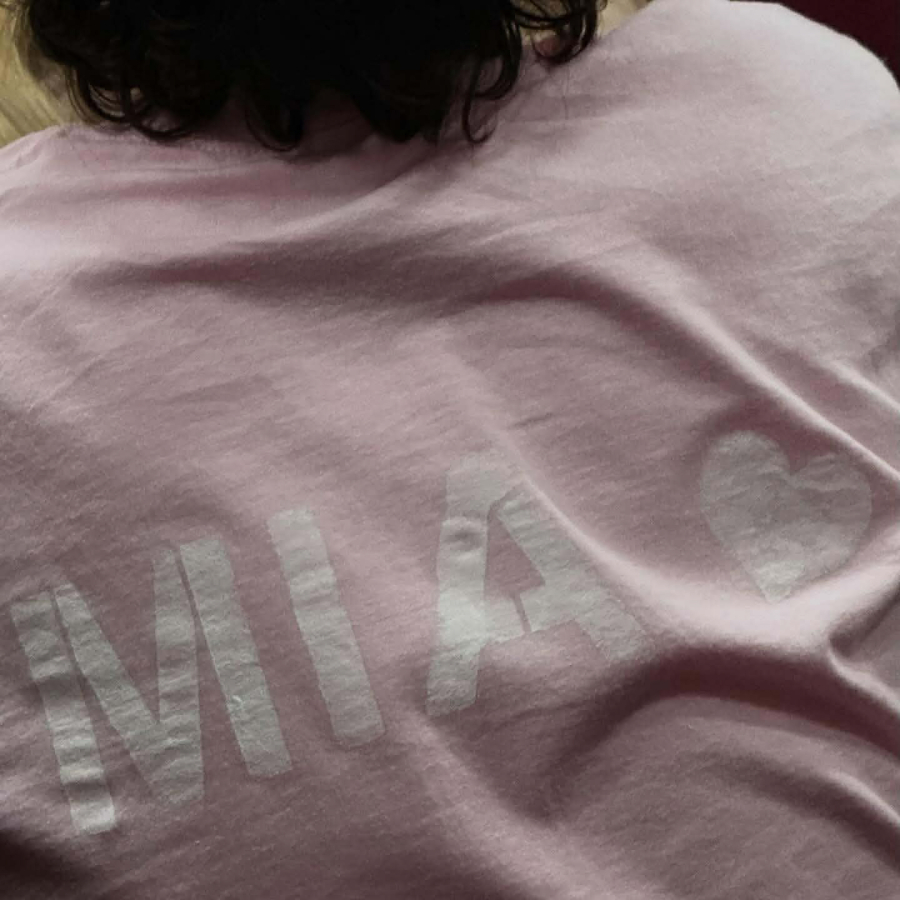 A student wears a pink &ldquo;Love Mia&rdquo; T-shirt during the Washougal High School boys basketball team&rsquo;s home game on Jan. 20. (Scott Lockard)