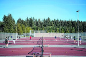 After the girls tennis spring season concludes, the eight tennis courts at Camas High School will be resurfaced prior to installation of an all-weather bubble. (Taylor Balkom/The Columbian files)