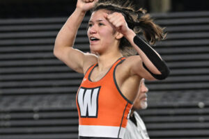 Washougal&rsquo; Victoria Nicacio celebrates her win Saturday during Mat Classic XXXVII at the Tacoma Dome in Tacoma. (Taylor Balkom/The Columbian)