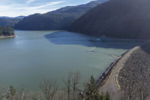 Swift Dam holds back Swift Reservoir on Jan. 16 in Cougar. Renewable energy developers face several hurdles when building projects in the Pacific Northwest. Public opposition, like that facing Swift Dam&rsquo;s operator PacifiCorp over its proposed Clark County transmission project, is one of them. (Photos by Taylor Balkom/The Columbian)